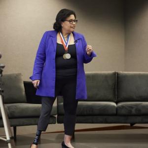 A person talking on stage