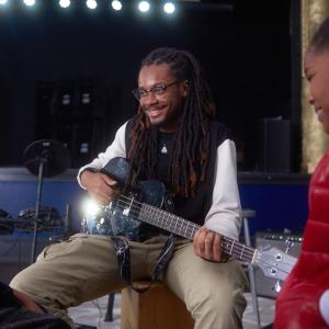 person playing a guitar