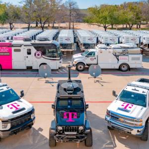 Multiple T-Mobile vehicles