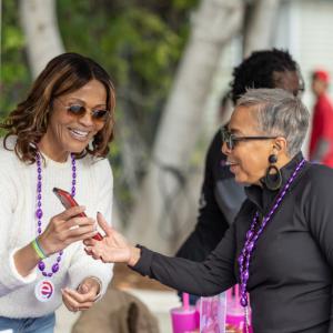 person showing another something