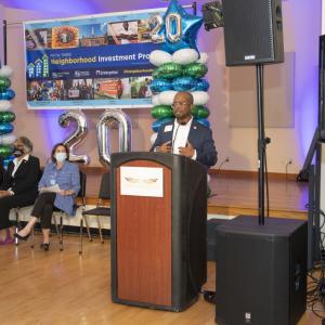 Man speaking at Columbus Neighborhood Investment Program announcement