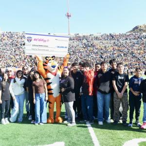 Students celebrate with Tony the Tiger 