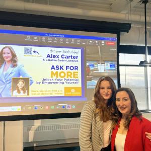 Columbia Law School professor Alexandra Carter and her daughter Caroline Carter Lembrich in front of a projector screen