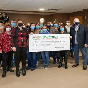 Mower County Health and Human Services check presentation