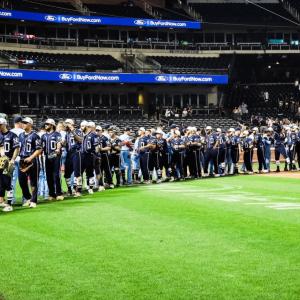 Two teams line up to congratulate each other