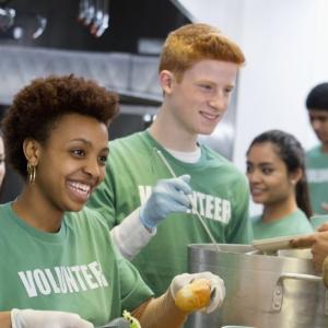 Volunteers serving food