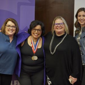 A group of people stood together for a photo