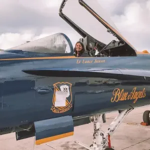 Joan Melendez Misner inside airplane cockpit