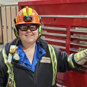 Darvi Higdon in safety gear at a work site