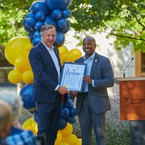 2 men with proclaimation