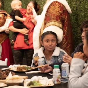 Families at the Holly Jolly Thanksgiving Dinner enjoyed full Thanksgiving meals and a visit from Santa Claus.