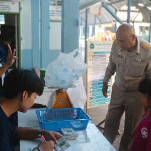 Two people serving customers 
