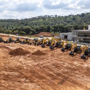 Construction equipment lined up outside CNH buiding