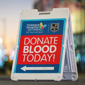Sign reading, "DONATE BLOOD TODAY!"
