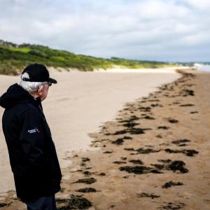 A person stood on the beach