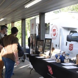 People looking at an event stand