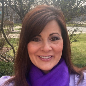 Person outside wearing purple