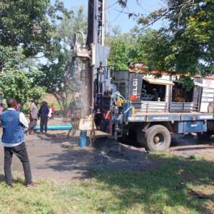 Action Against Hunger drills boreholes to supply clean water.