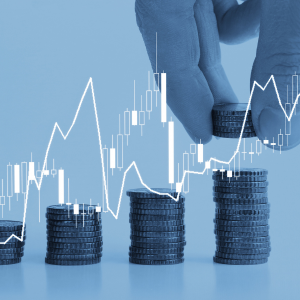 Stacked coins and line of data