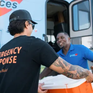 Direct Relief staff delivered medical aid to NC MedAssist in Charlotte, N.C., on Oct. 7, 2024, as part of Hurricane Helene response efforts. The statewide charitable pharmacy, which serves primarily uninsured patients, received tetanus vaccines, epinephrine, field medic packs, and other emergency supplies to support storm recovery and mobile outreach. (Photo by David Uttley for Direct Relief)