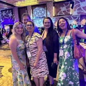 Five people stood together for a photo