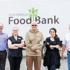 People standing in front of Kenai Peninsula Food Bank truck