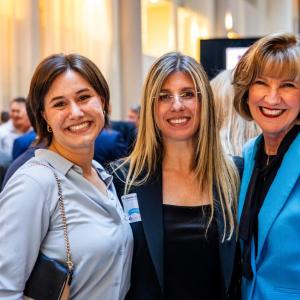 three people at a banquet