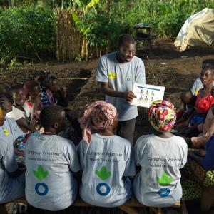 Rodger teaches fellow volunteers about the importance of a healthy diet.