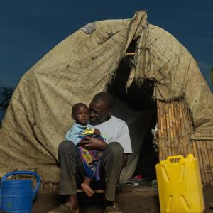 One year old, Musa Moize, and his father Rodger at home.