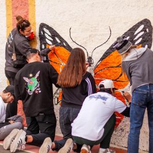 Employee volunteers from AEG painted a butterfly to brighten up the campus of 10th Street Elementary School in downtown Los Angeles.