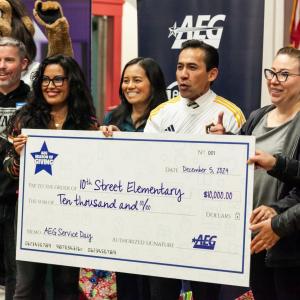 AEG presented both schools with donations underscoring the company’s ongoing commitment to community impact.