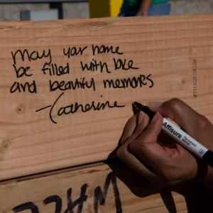 AEG employees wrote well wishes and words of encouragement for the families in the wall frames they constructed.