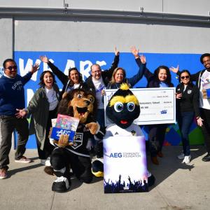 49th Street Elementary received a check donation of $10,000 from AEG. 