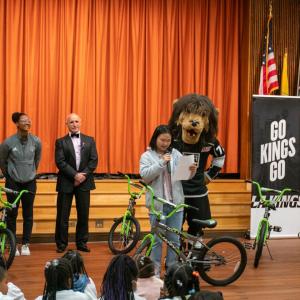 A student from Annalee Elementary reads their essay during the assembly.