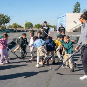 LA Kings Hockey Development Team hosts a ball hockey clinic for the students.
