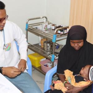 Abay and her daughter during a consultation with a doctor in the first week of treatment.