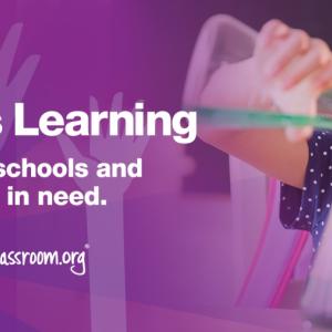 Student in science class with chemistry equipment 