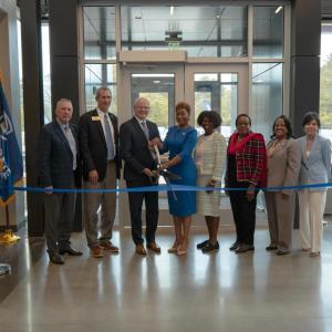 Group photo of the ribbon cutting