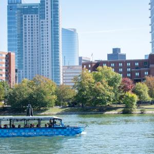 Boston Duck Tour on the Charles with Aflac checked for cancer.