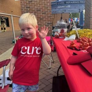 Charlotte shown at the Firefighters 5K.