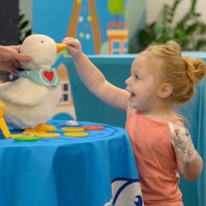 Young patient shown with an Aflac My Special Duck.