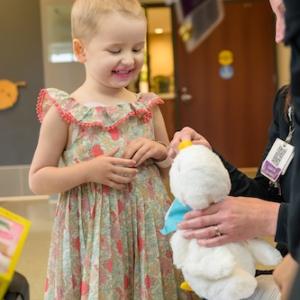 Patient being presented an Aflac My Special Duck.