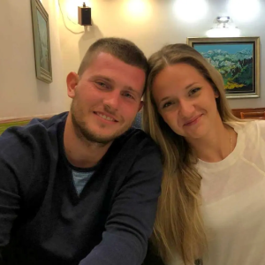 Aleksandra shown with a friend.