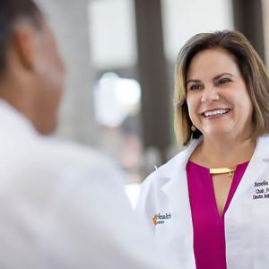 Amelie Ramirez in doctor's coat