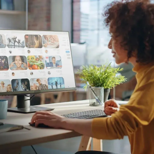 Female on a zoom call at her desktop.