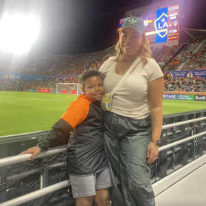Angora and her son at a soccer game.