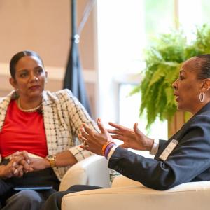 people talking at event