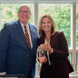 people holding prize together at event