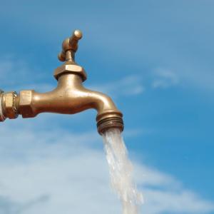 Water spout with water flowing