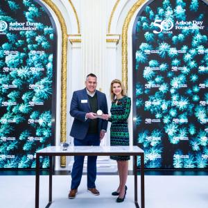 Dan Lambe, Arbor Day Foundation CEO (left) and Tara Dziedzic, Head of Listings - US Sectors, New York Stock Exchange (right)